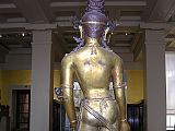 British Museum Top 20 Buddhism 09-2 Standing Avalokiteshvara Back Standing Avalokiteshvara � Nepal, 16C AD, 138cm high. Here is a view from behind Avalokiteshvara. This very large image was made in gilded bronze in several pieces. Rivets above the waist and above the elbows hold the figure together.